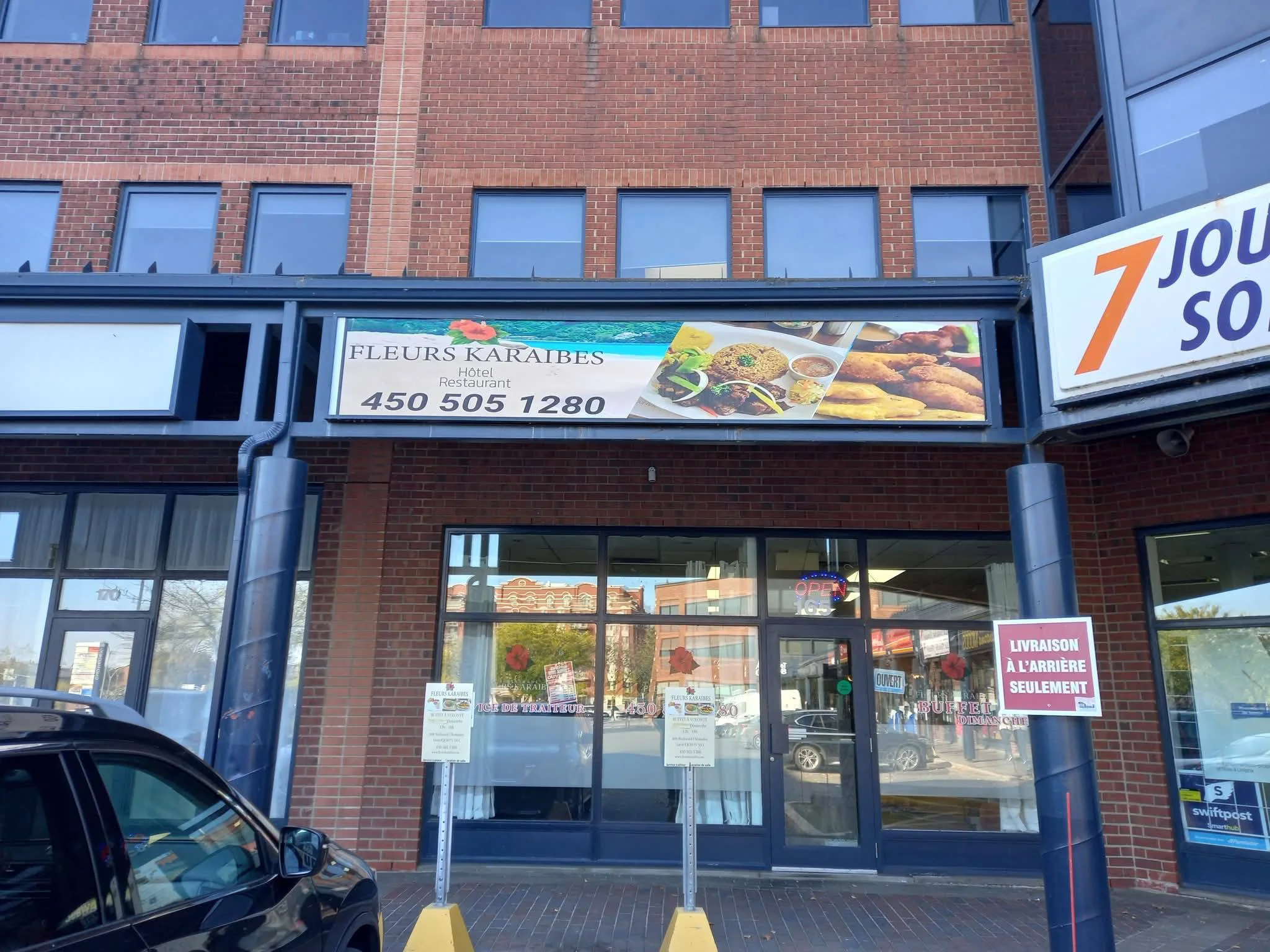 Custom LED lightbox sign installed on Montreal commercial storefront — Max Printing fabrication and installation